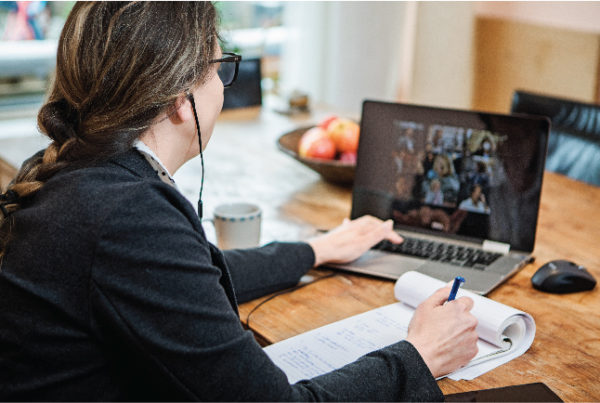 Woman at computer video streaming