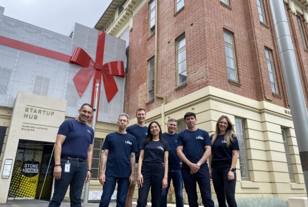 Link4 team standing infront of Stone & Chalk building