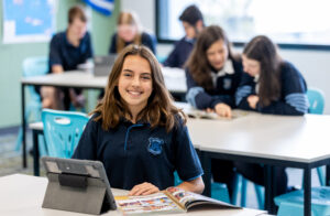 Student in classroom with laptop at Unley High School