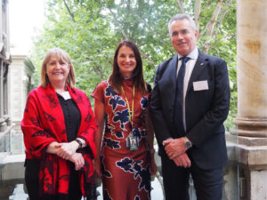 Chris Brebner, Sandra Vallance and David Lewis standing on balcony at Adelaide Town Hall